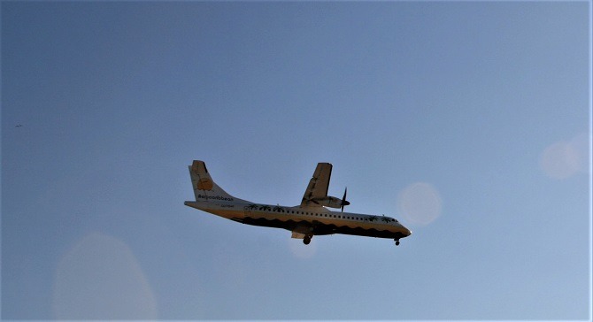 An Aerocaribbean aircraft in-flight over Cuba