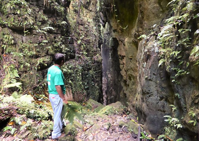 The defensive cliff at the entrance to Aguateca