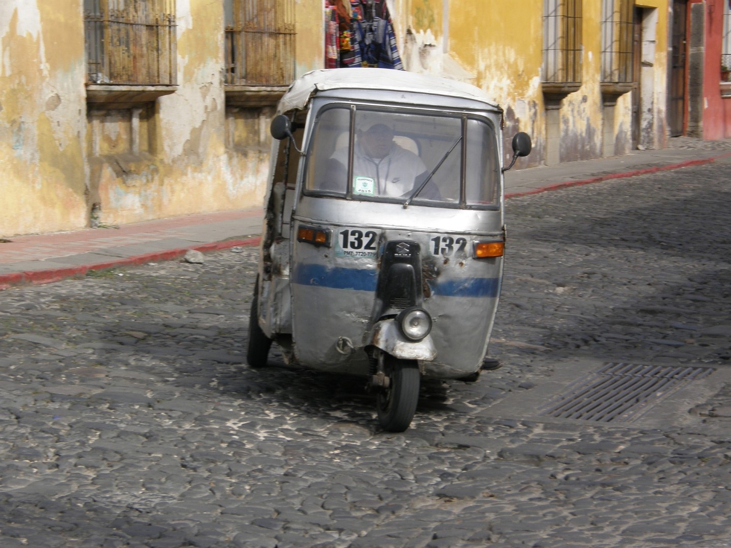 Rickshaw on cobbled streets of Antigua, Guatemala