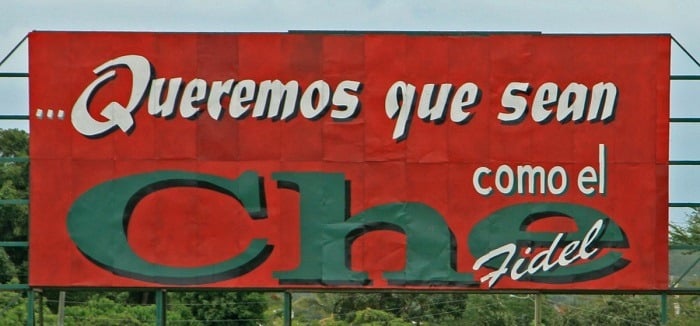 A Che Guevara poster by the roadside in Cuba