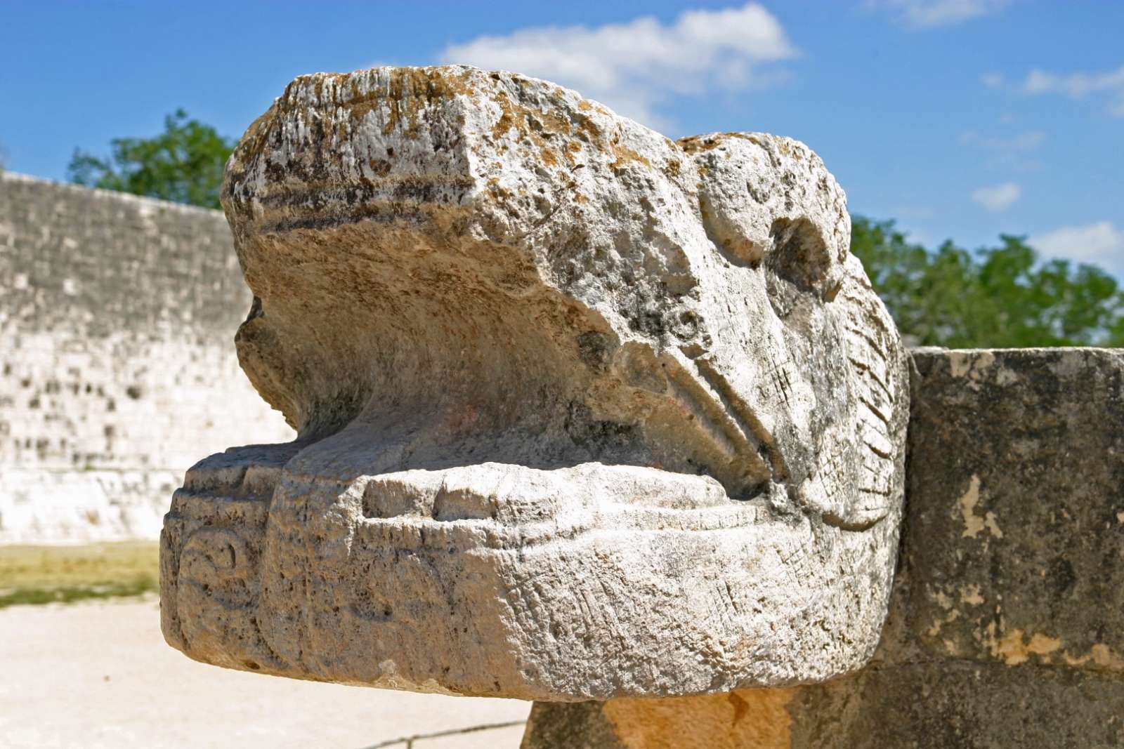 Snake head carving at Chichen Itza