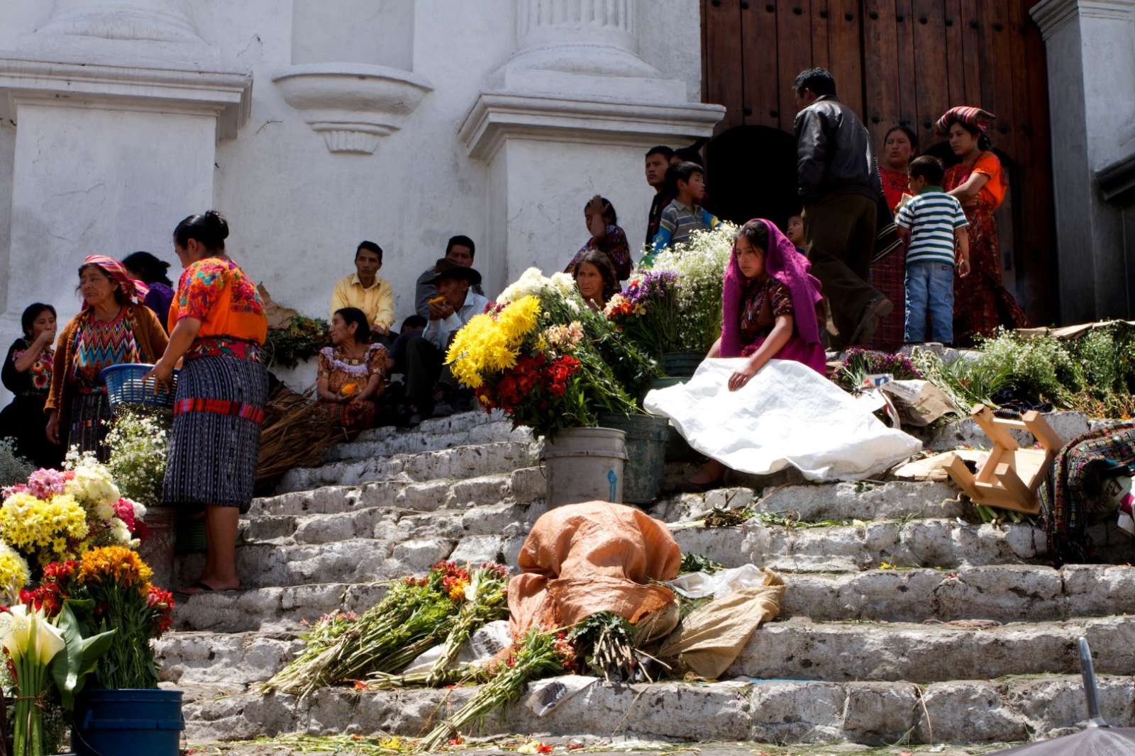 Girl selling flowers in Chichicastenango, Guatemala