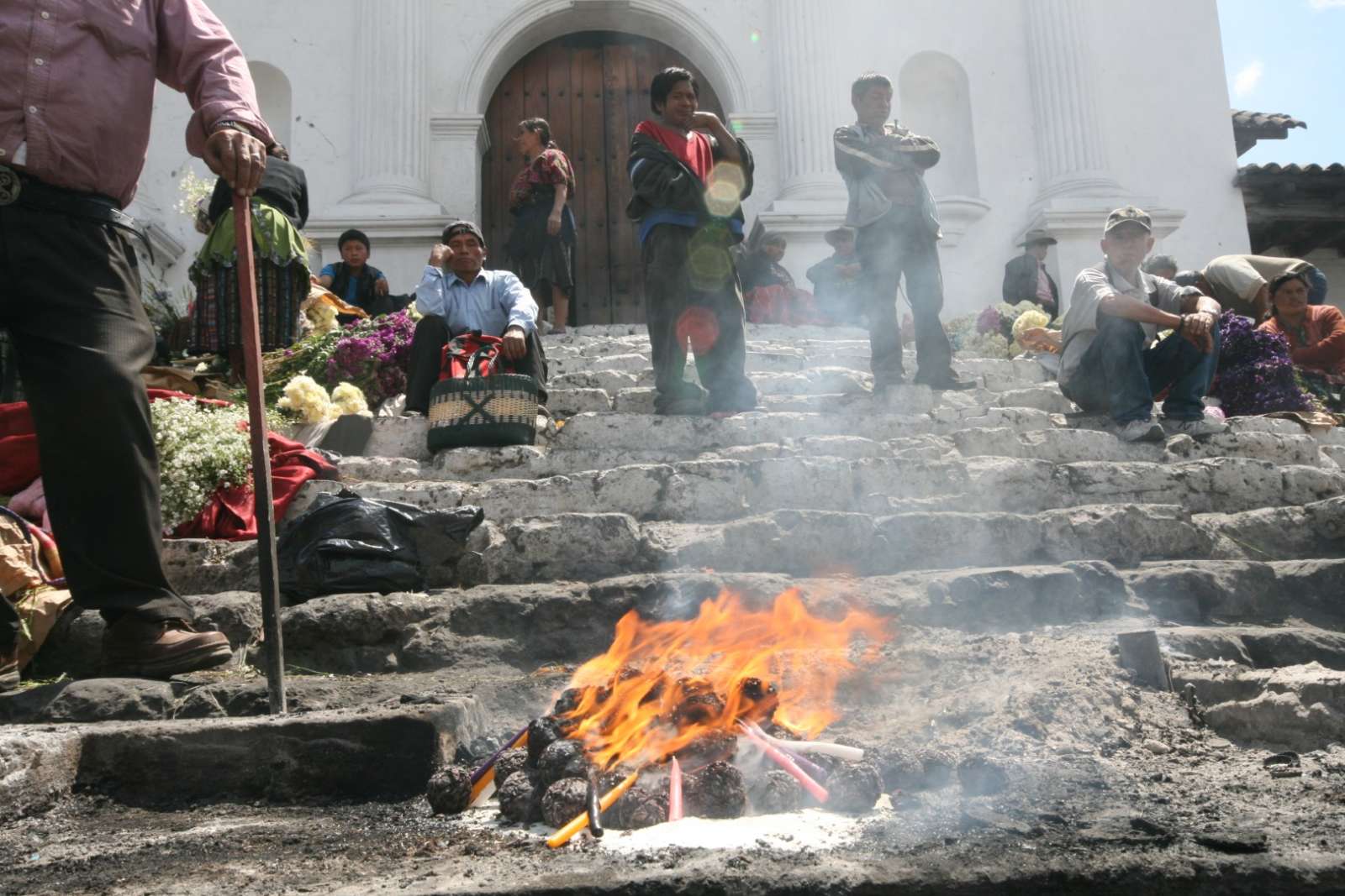 Religious offering on the church steps at Chichicastenango, Guatemala