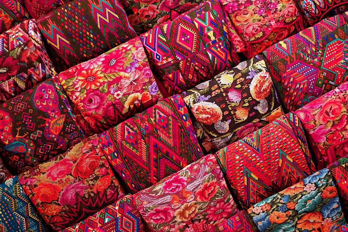 Colourful textile blankets at market in Chichicastenango, Guatemala