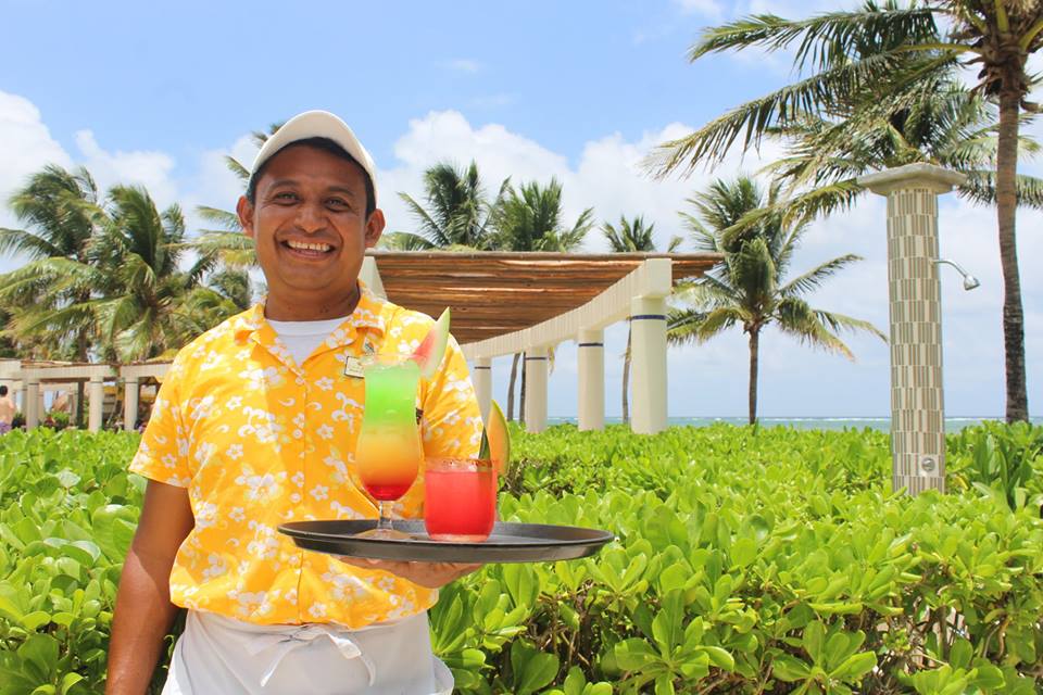 Waiter with cocktails at Dreams Tulum