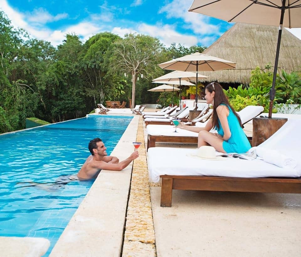 Couple at Explorean Kohunlich pool