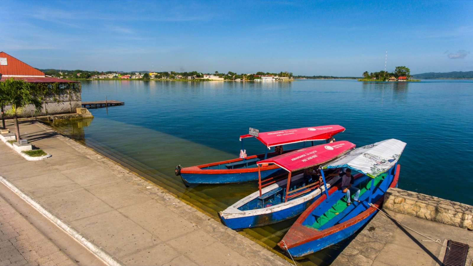Water taxis moored up in Flores, Guatemala