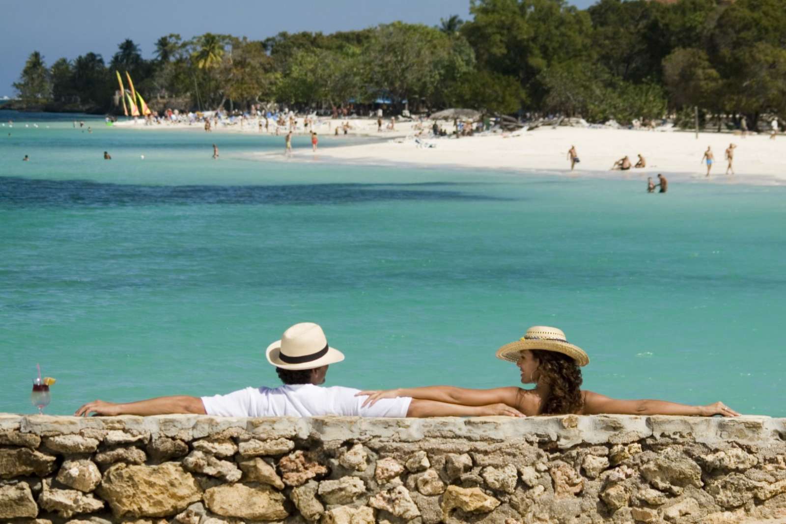 Couple overlooking a beach in Guardalavaca, Cuba