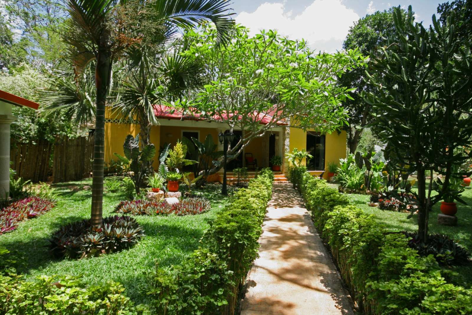 Pathway to bungalow at Hacienda Chichen Itza