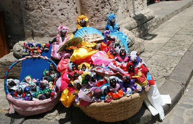 A basket of traditional Cuban dolls in Cathedral Square, Havana