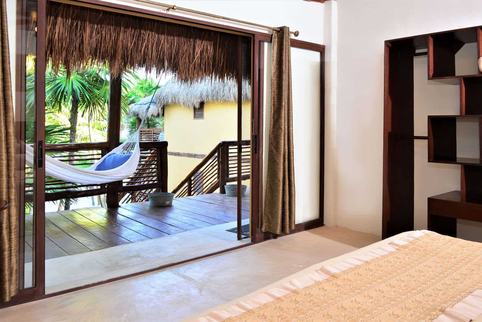 Bedroom and balcony at Hip Hotel Tulum