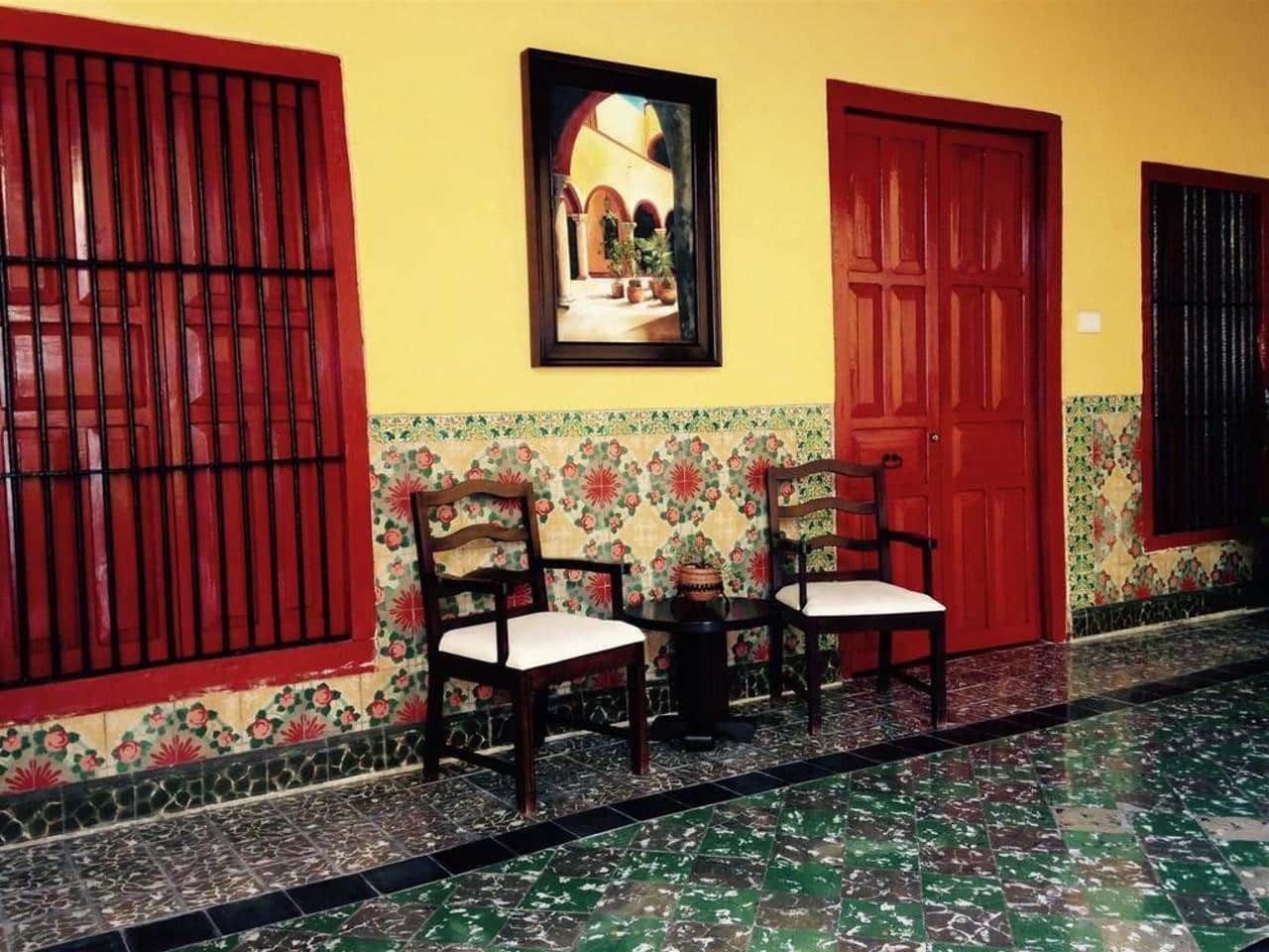 Chairs in corridor at Hotel Castelmar Campeche