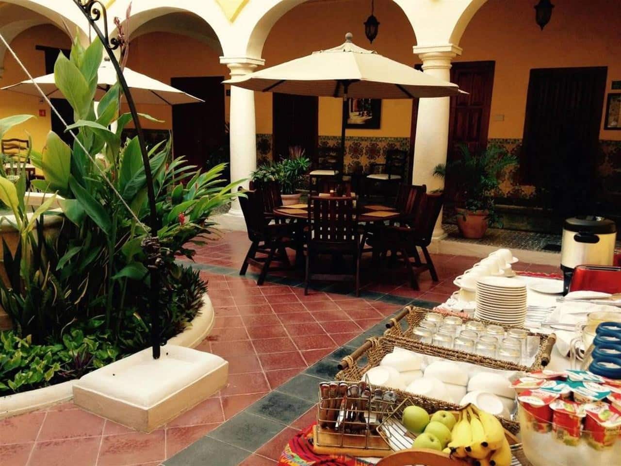 Breakfast in courtyard at Hotel Castelmar Campeche