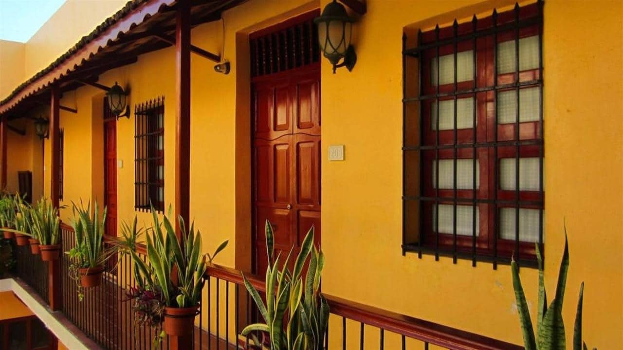 Corridor outside rooms at Hotel Castelmar Campeche