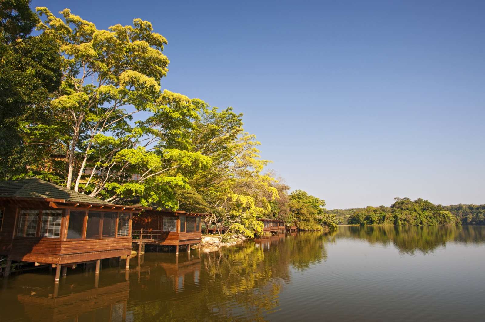 Bungalows facing lake at Hotel Las Lagunas, Guatemala