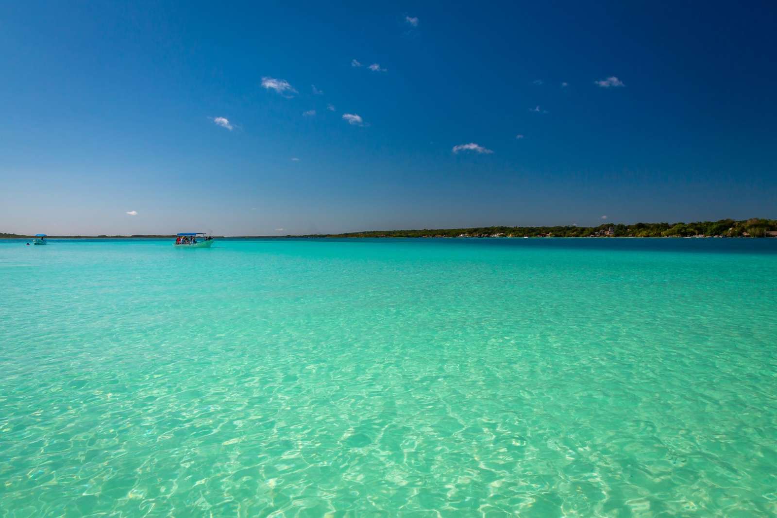 Distant boats on Laguna Bacalar