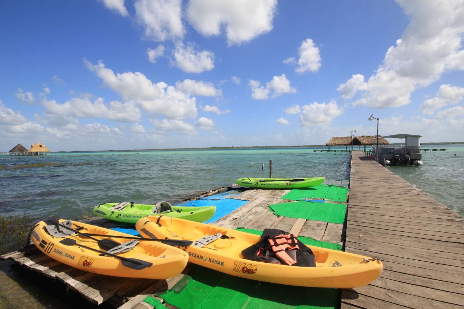 Kayaks on jetty at Laguna Bacalar