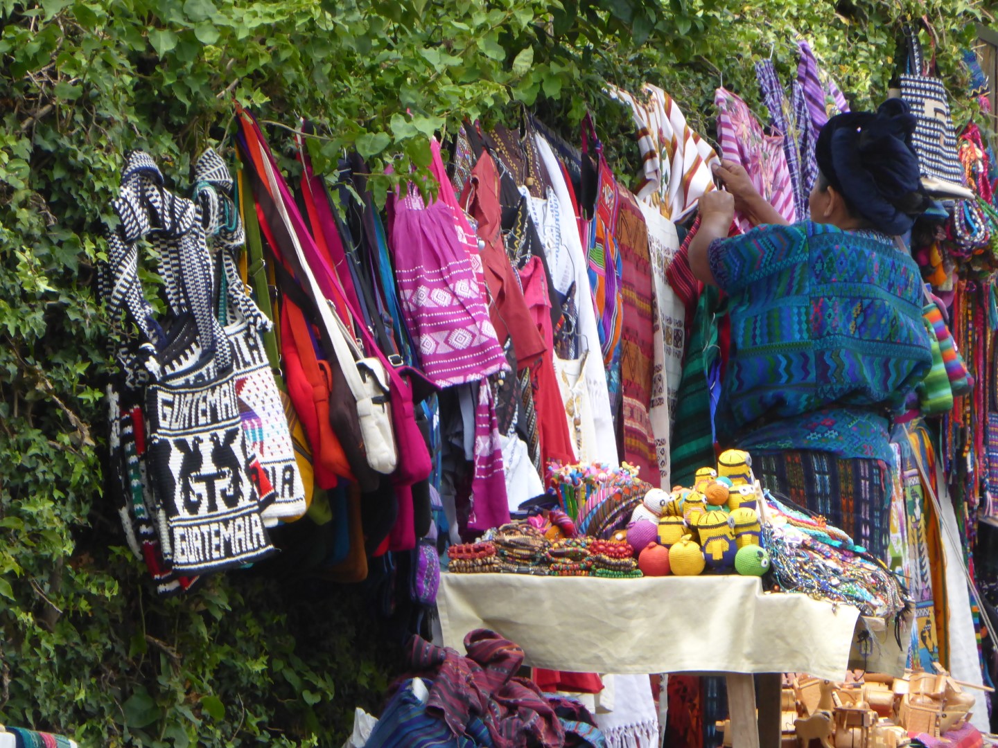 Hawker selling traditional goods at Lake Atitlan, Guatemala