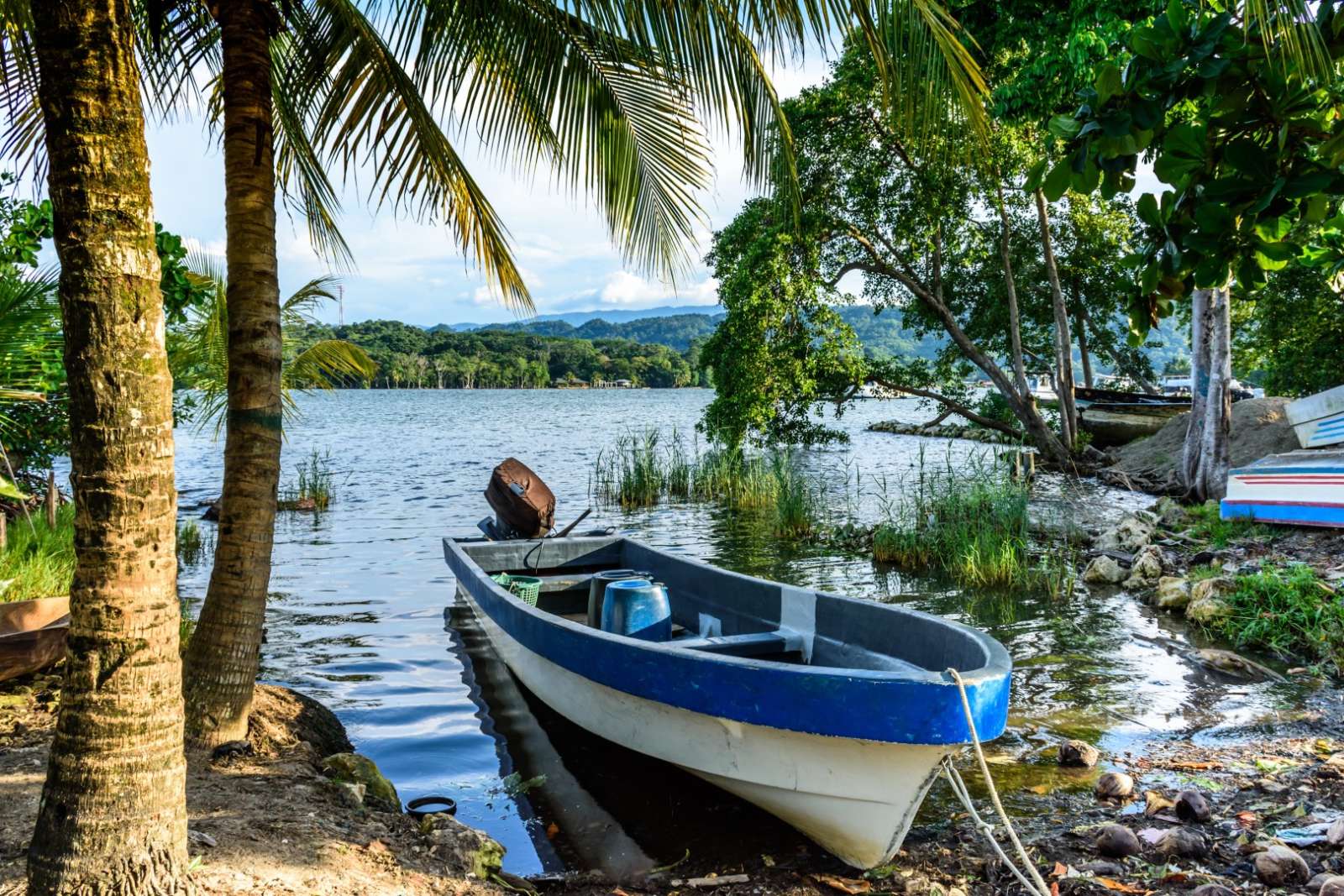 Small fishing boat on Rio Dulce near Livingston, Guatemala