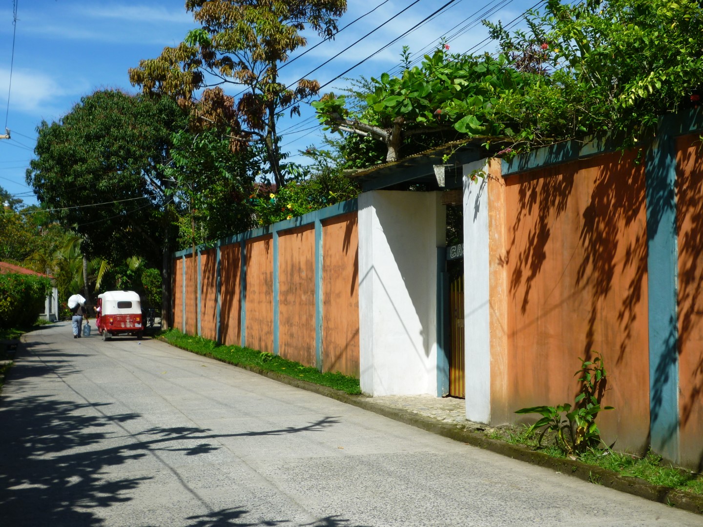 Wall alongside a quiet street in Livingston, Guatemala