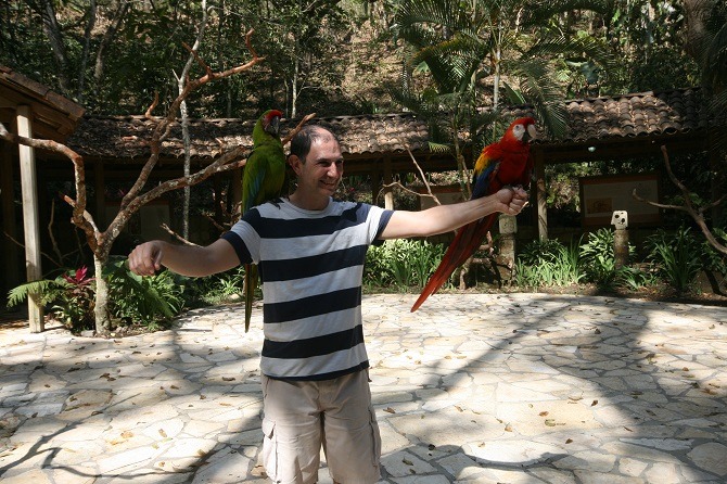 A visitor to Macaw Mountain Park in Copan, Honduras