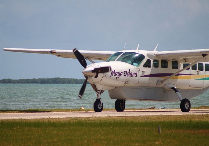 A Maya Island Air plane on the runway