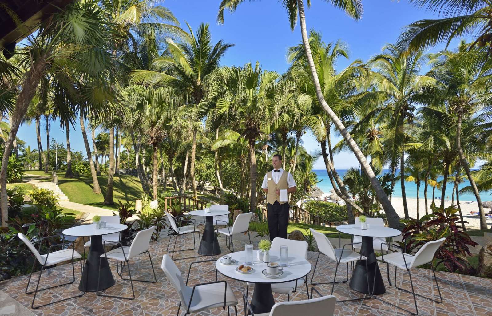 Waiter at Melia Las Americas beach view restaurant