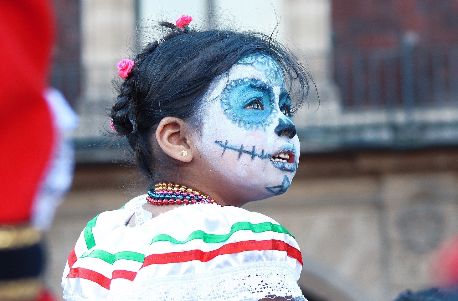 Young Mexican girl celebrating Day of the Dead