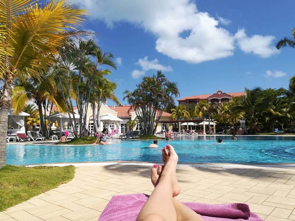 Woman's legs at pool of Paradisus Princesa Varadero