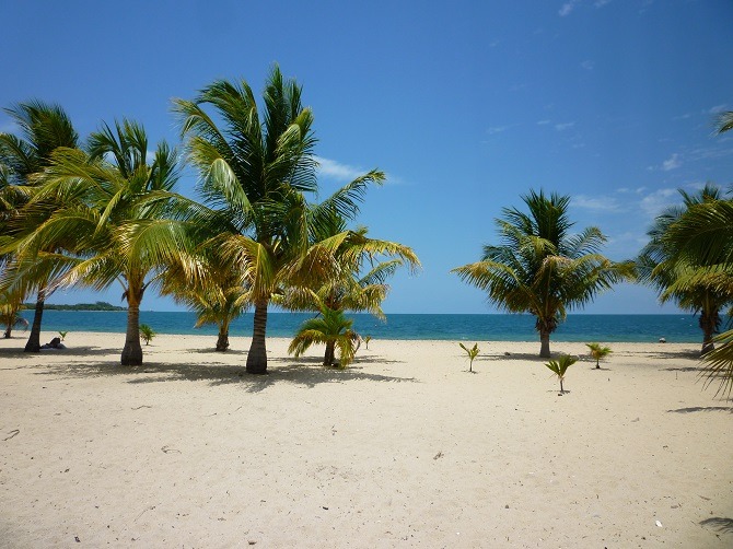 A wide expanse of beach at Placencia Village