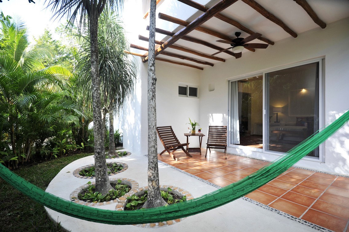 Terrace and hammock at Rancho Encantado Bacalar