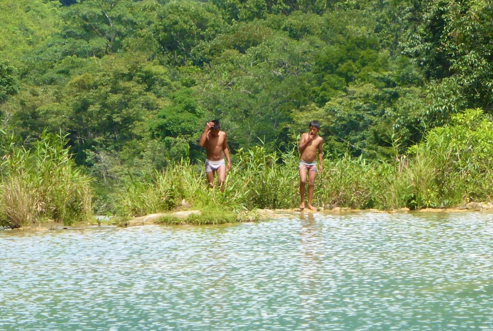 Two boys at Semuc Champey in Guatemala