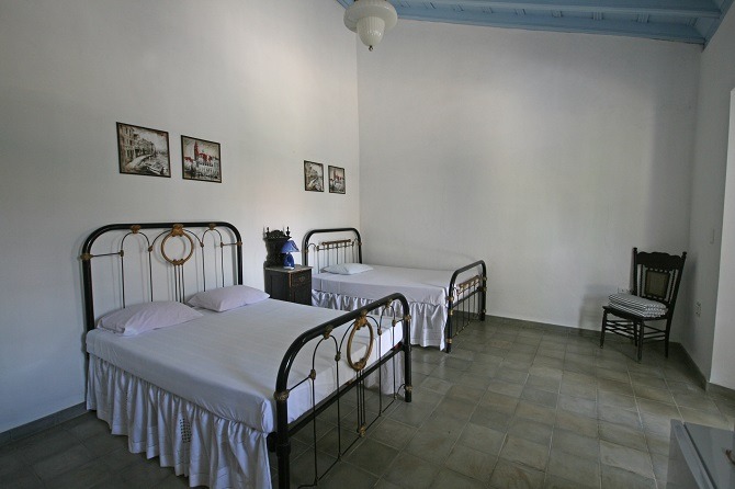 A bedroom at Casa Real 54 in Trinidad, Cuba