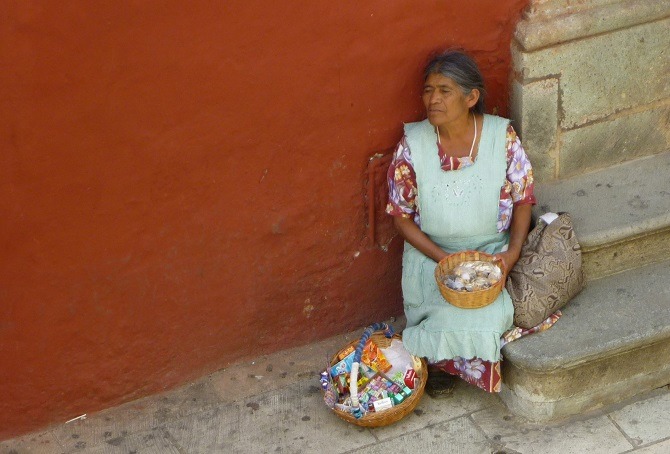 A old lady selling small items in Mexico