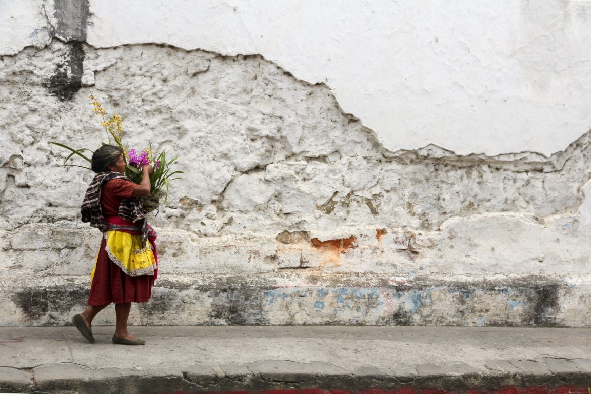 A mayan woman selling flowers