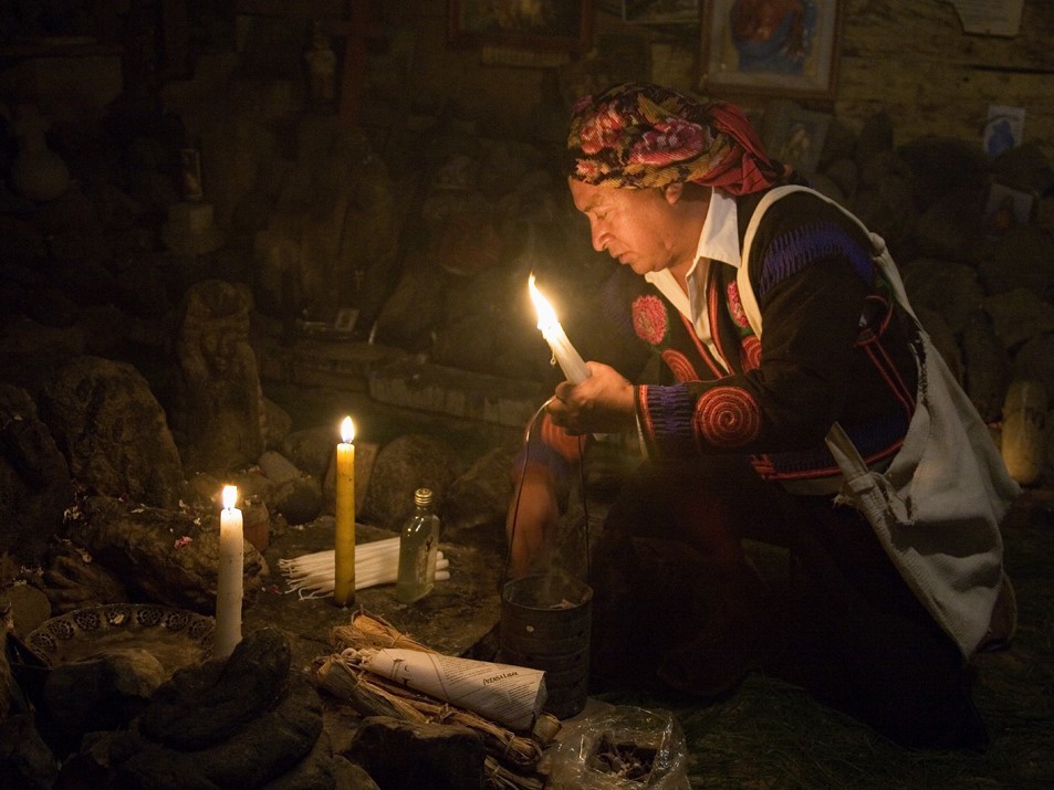 Man performing a traditional Mayan ceremony in Guatemala