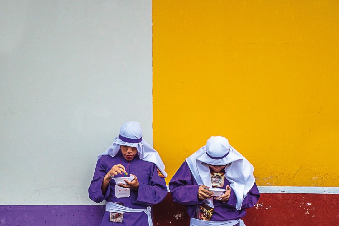 Two men eating outside during Easter