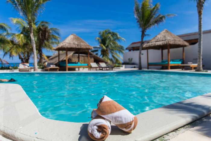 Swimming pool at Hotel Ojo de Agua in Puerto Morelos