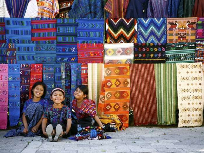 Three smiling Mayan girls at Solola Market