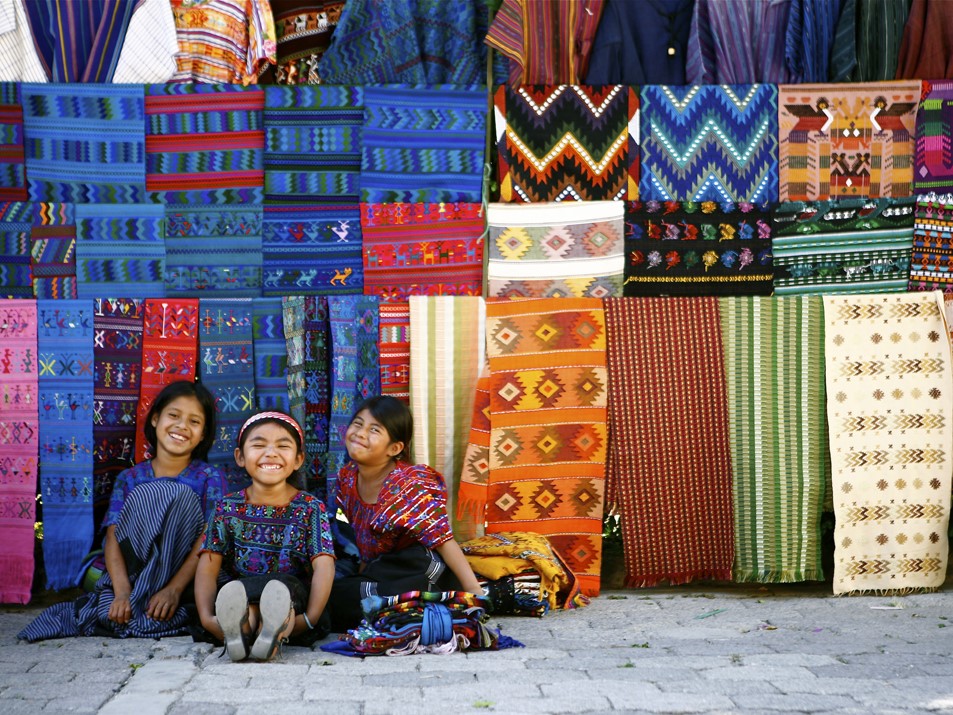 Three smiling Mayan girls at Solola Market