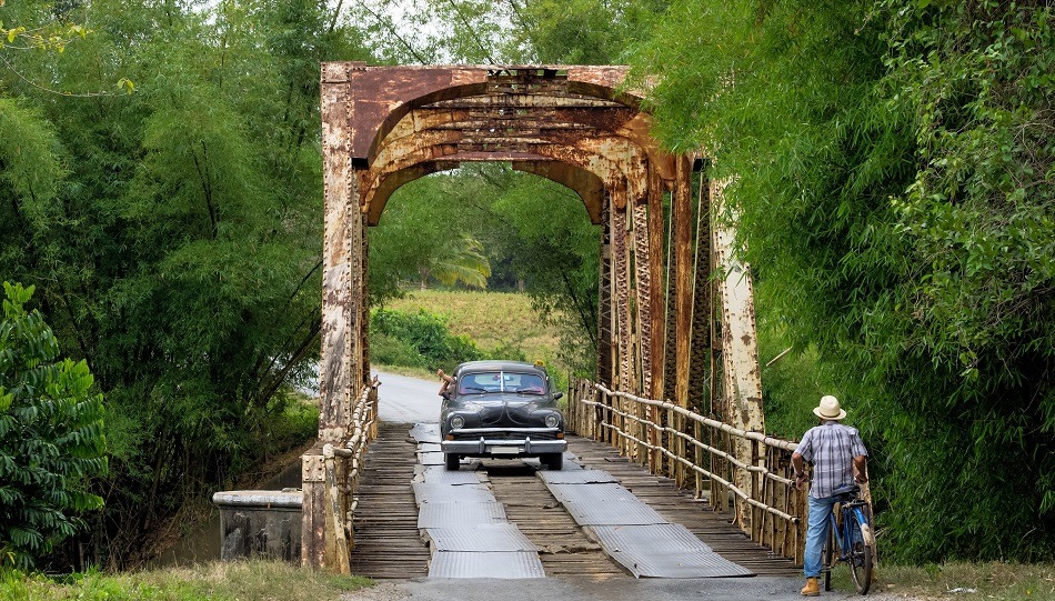 Car crossing bridge in Vinales Cuba