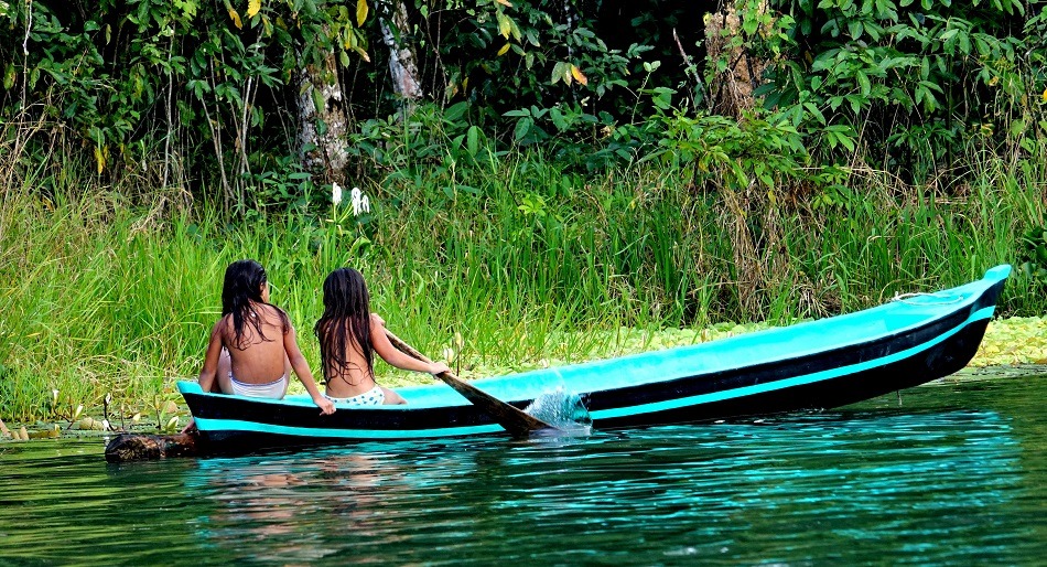 Two young children in a canoe