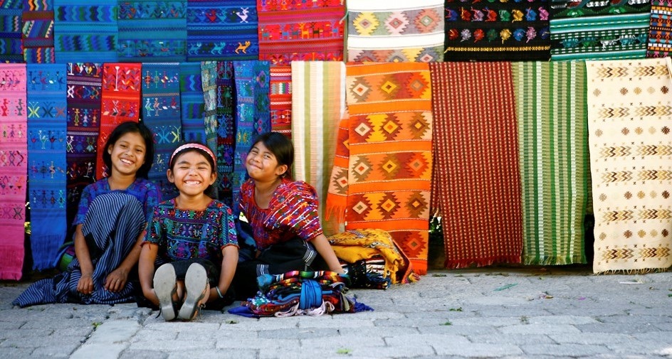 Three young girls at market