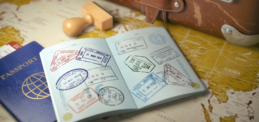Open passport with stamps