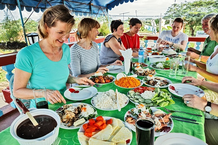 Enjoying lunch on a group tour of Cuba