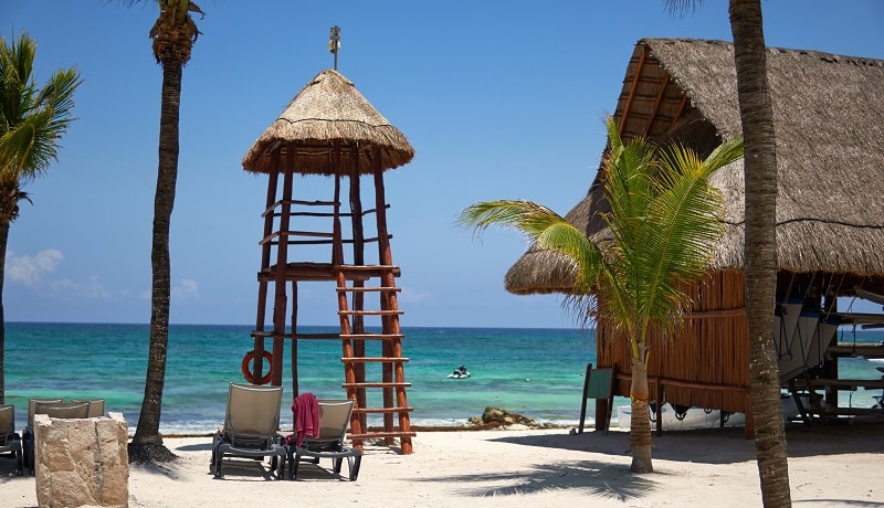 Watch tower and palapa by the beach in Mexico