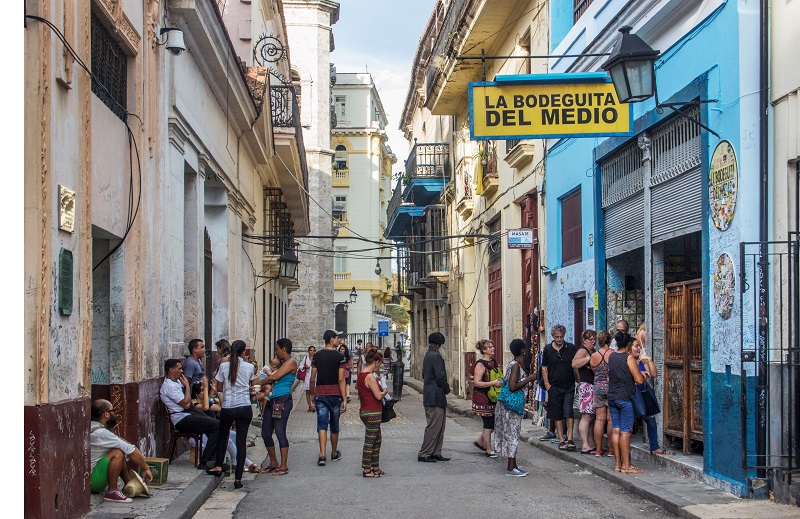 Customers on the street outside La Bodeguita Del Medio in Havana