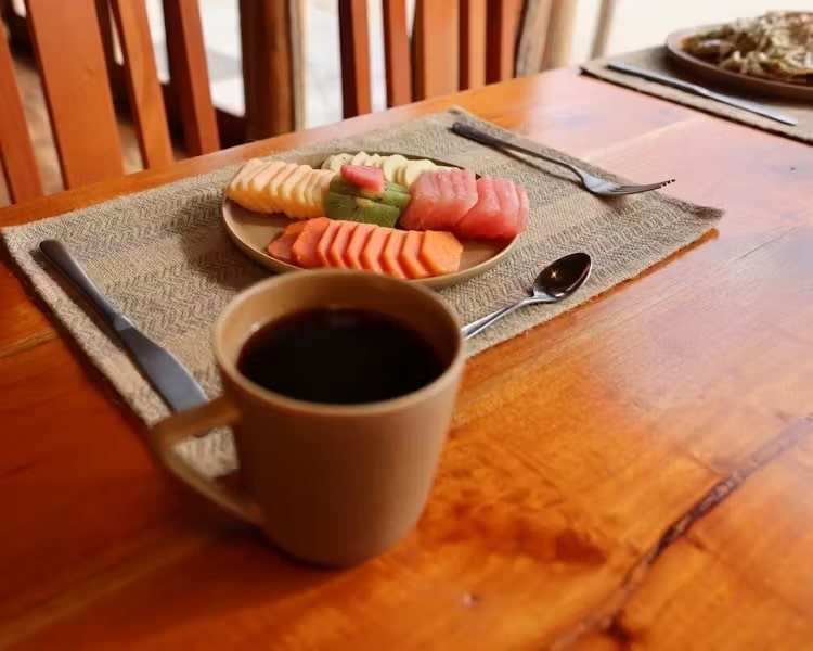 Breakfast of coffee and fruit plate in Calakmul