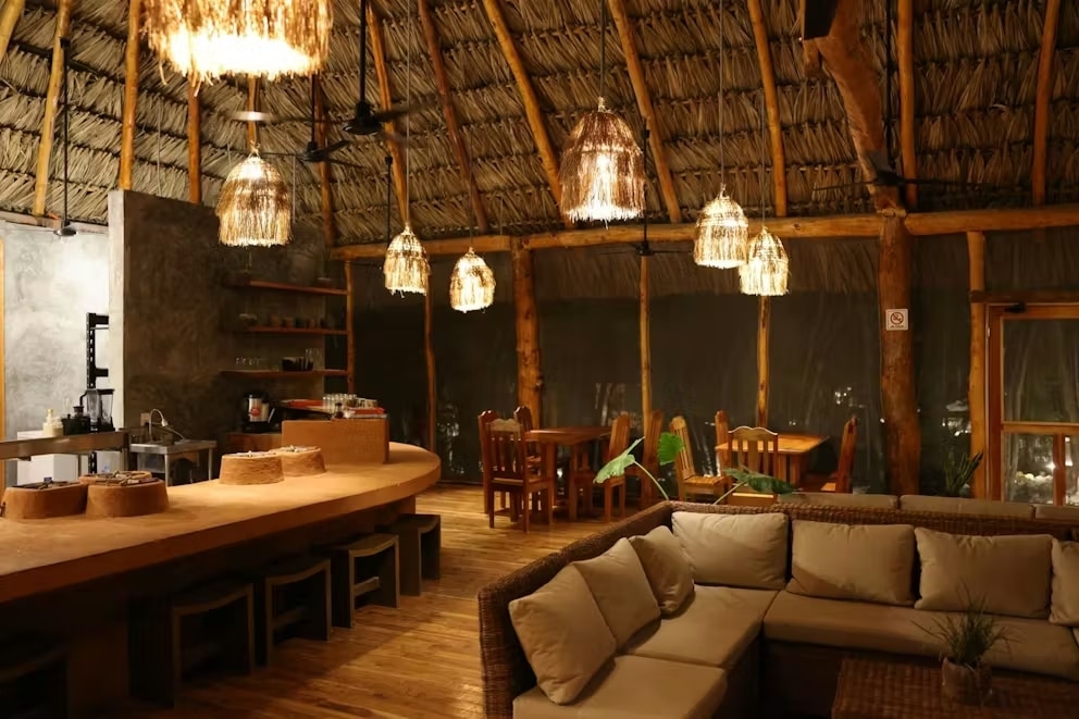 Hotel lounge with sofa, tables and soft lighting