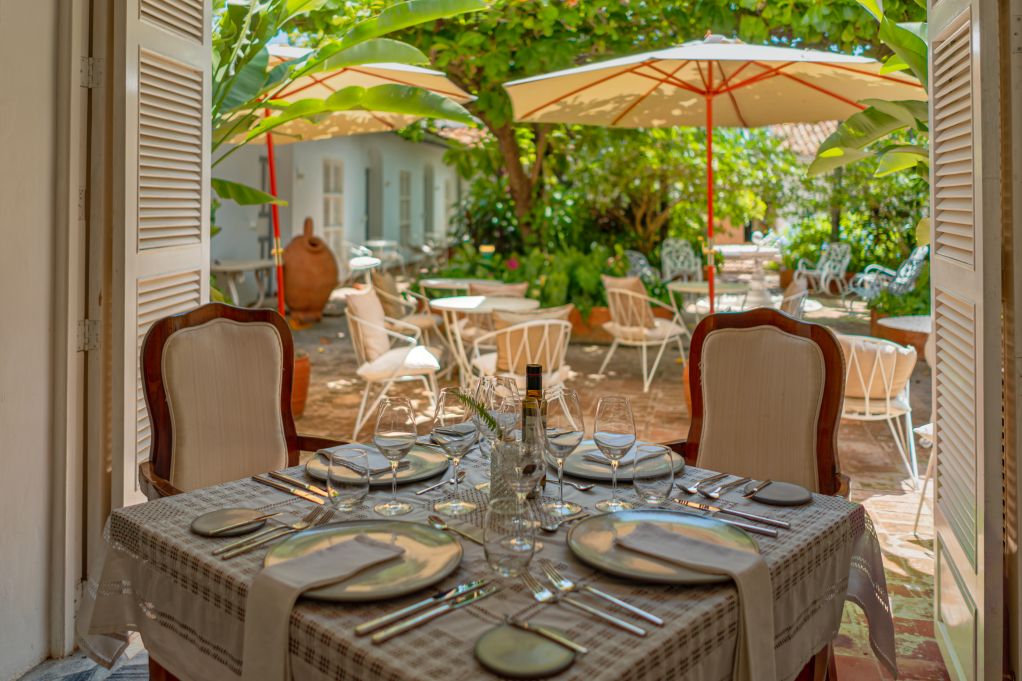 Hotel restaurant in Trinidad overlooking patio garden